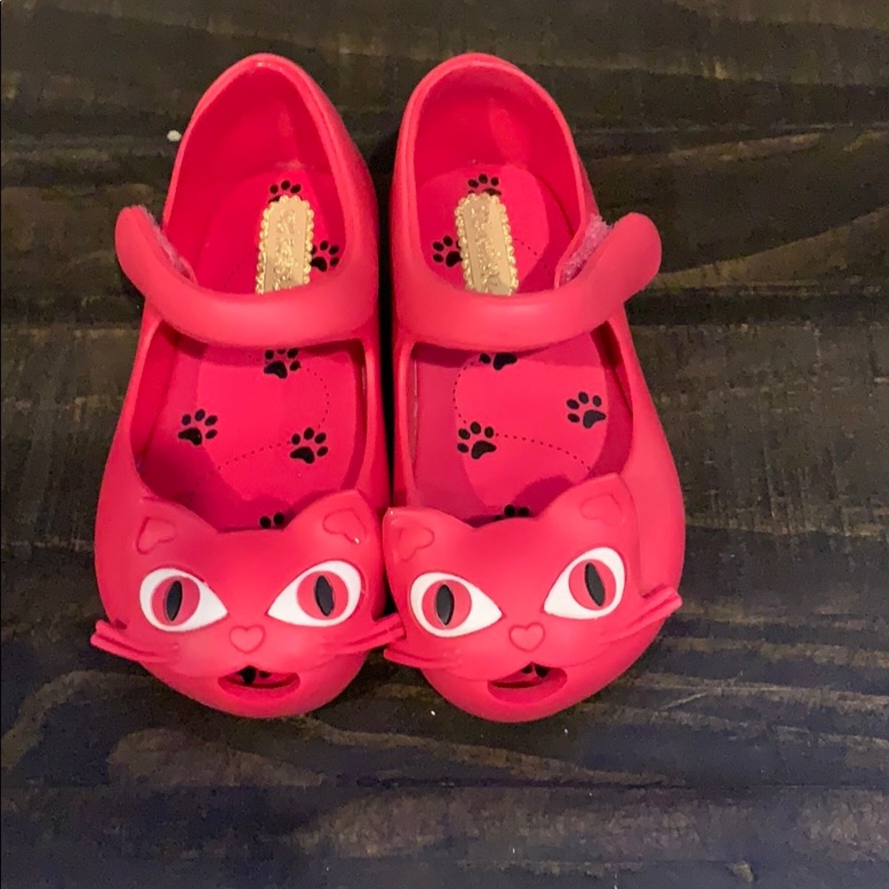 4 Pair - Mini Melissa shoes.